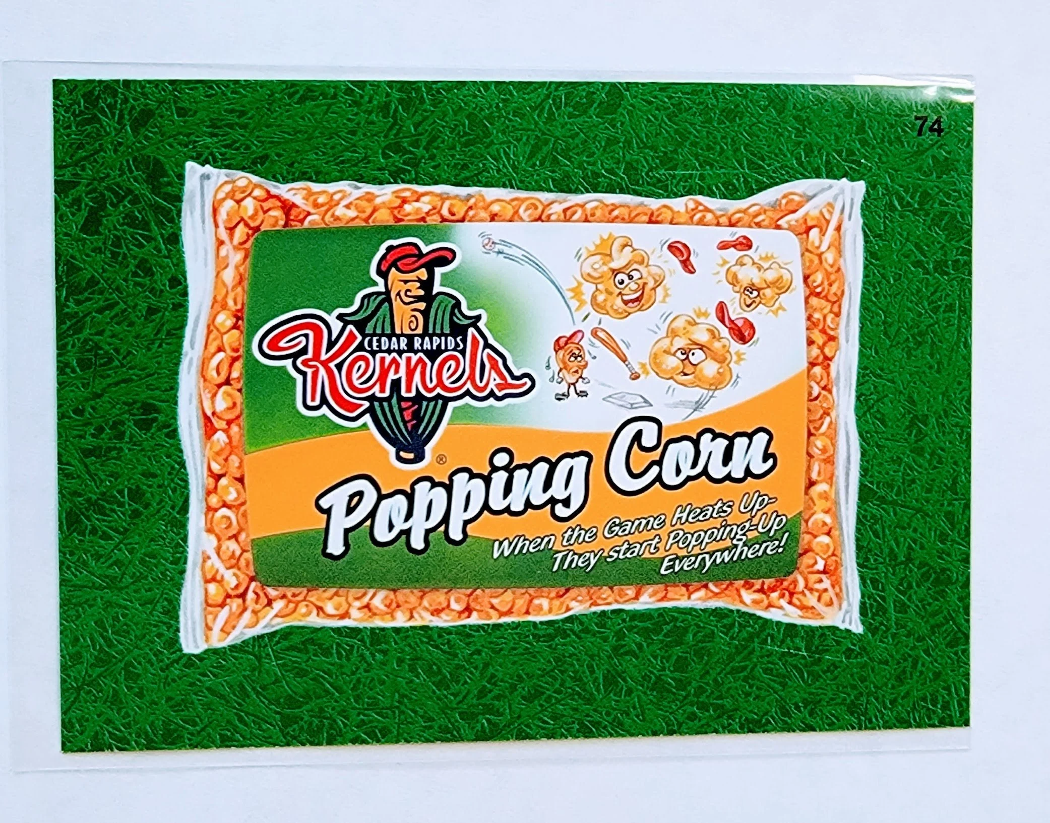 2016 Topps MLB Baseball Wacky Packages Cedar Rapids Kernals Popping Corn Green Grass Parallel Sticker Trading Card MCSC1