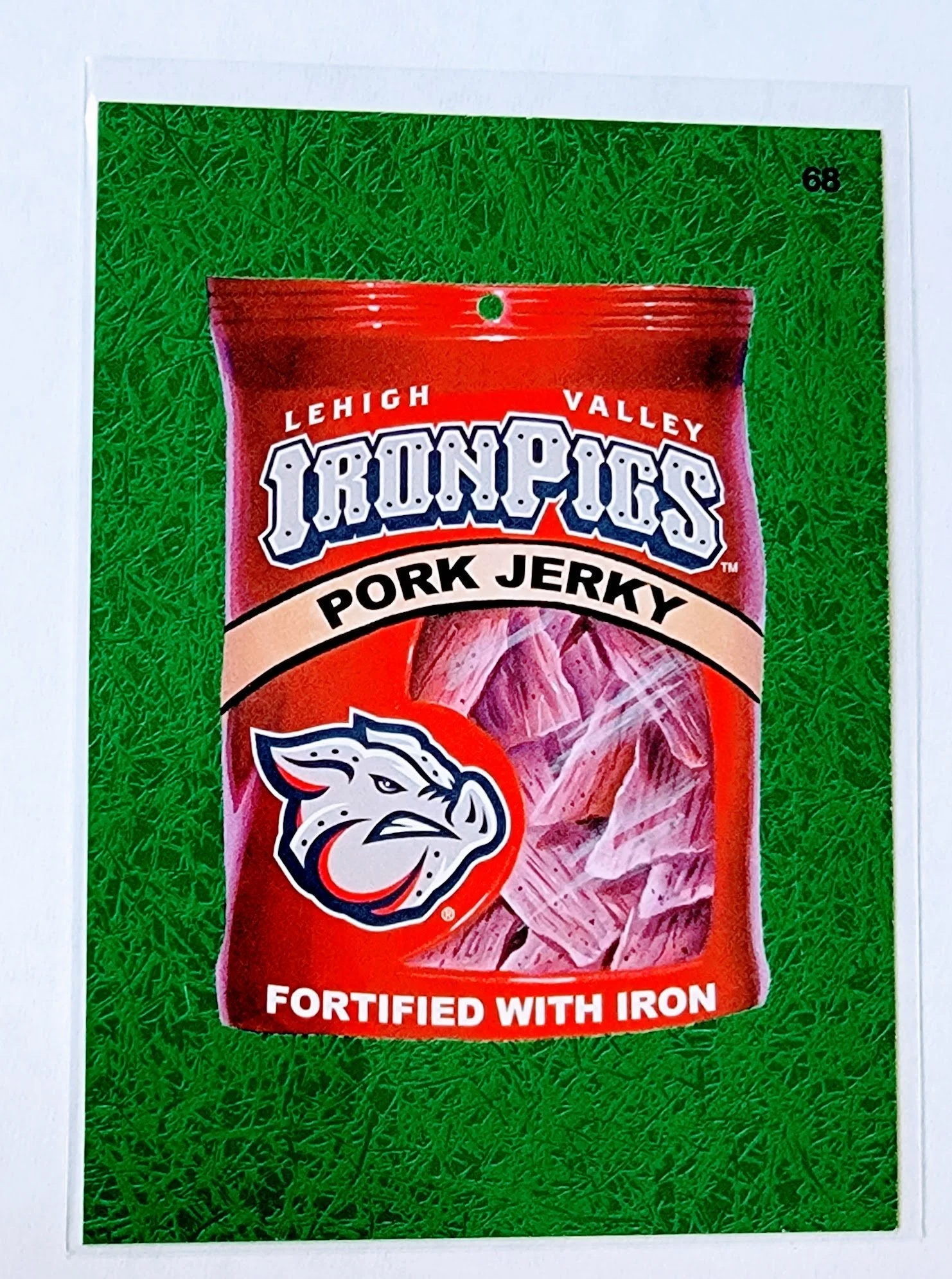 2016 Topps MLB Baseball Wacky Packages Iron Pigs Pork Jerky Green Grass Parallel Sticker Trading Card MCSC1